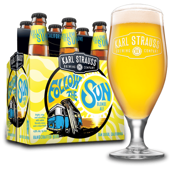 glass of beer next to six pack of follow the sun blonde ale