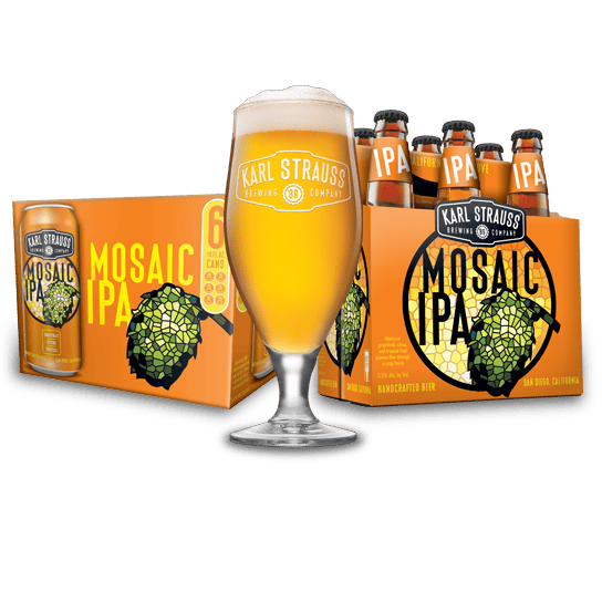 glass of beer next to six pack of mosaic ipa