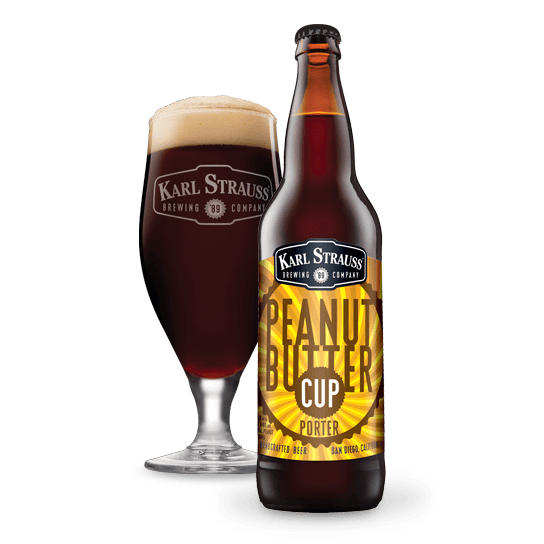 peanut butter cup porter 22 ounce bottle and glass with beer