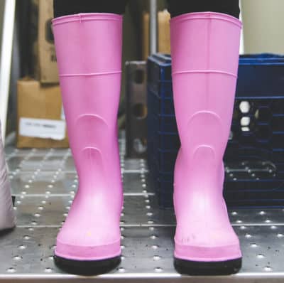 pink boots in brewery