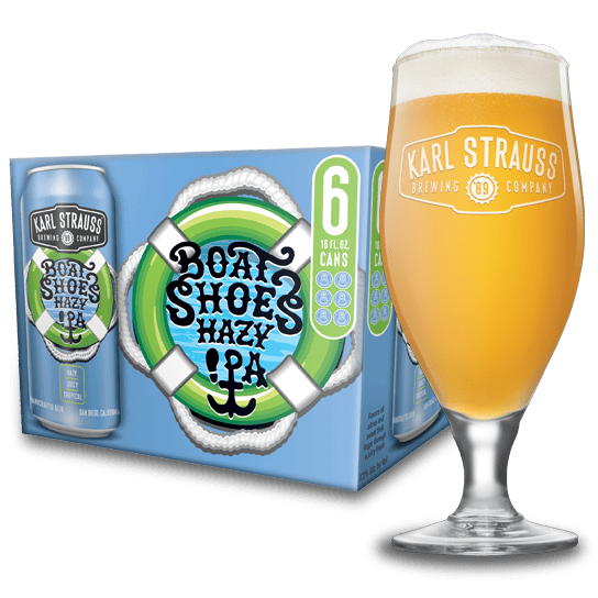 Glass of beer next to Boat Shoes Hazy IPA package